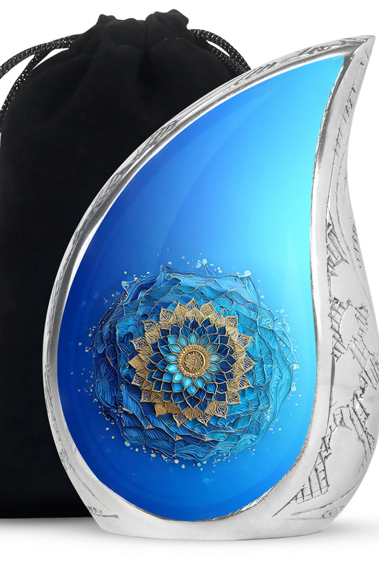 Ocean Teal Blue Cremation Urn front view showing detailed design - flowing teardrop blue silhouette on curved aluminum - full-size 10 inch 200 cubic inch adult cremation urn