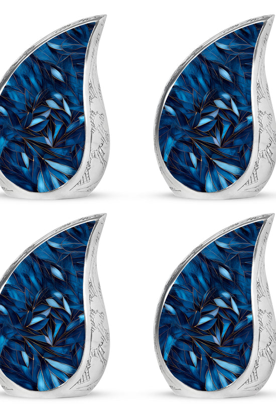 Powder Blue Blue Cremation Urn close-up of engraving and surface detail - rounded teardrop blue design with delicate detail - 10 inch aluminum urn for cremated remains