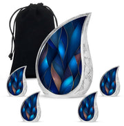 Royal Blue Blue Cremation Urn side profile showing urn shape - smooth teardrop contour featuring blue art - memorial set with one large and four small urns