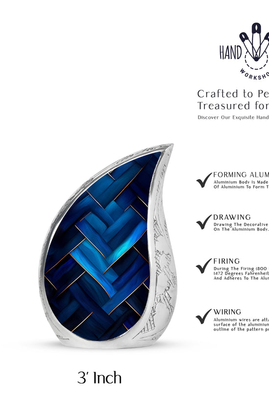 Dusty Blue Blue Cremation Urn angled view of lid and engraved motif - rounded teardrop blue design with delicate detail - mini keepsake memorial for portion of cremation ashes
