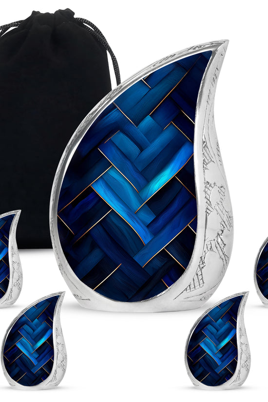 Azure Blue Cremation Urn side profile showing urn shape - rounded teardrop blue design with delicate detail - memorial set with one large and four small urns