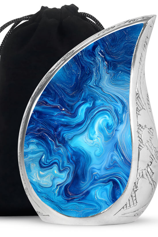 Sea Green Teal Blue Cremation Urn front view showing detailed design - flowing teardrop blue silhouette on curved aluminum - full-size 10 inch 200 cubic inch adult cremation urn