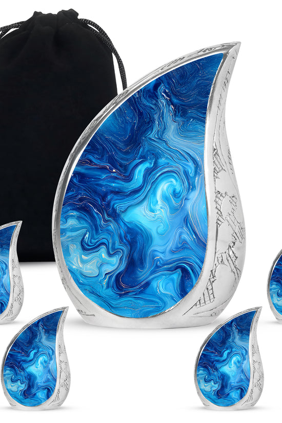 Vivid Teal Blue Cremation Urn side profile showing urn shape - graceful tear-shaped urn with blue motif - memorial set with one large and four small urns