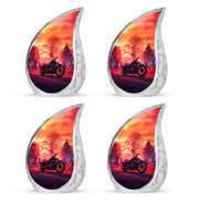 Fiery Red Bike Cremation Urn close-up of engraving and surface detail - graceful tear-shaped urn with bike motif - 10 inch aluminum urn for cremated remains