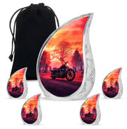 Wine Red Bike Cremation Urn side profile showing urn shape - flowing teardrop bike silhouette on curved aluminum - memorial set with one large and four small urns