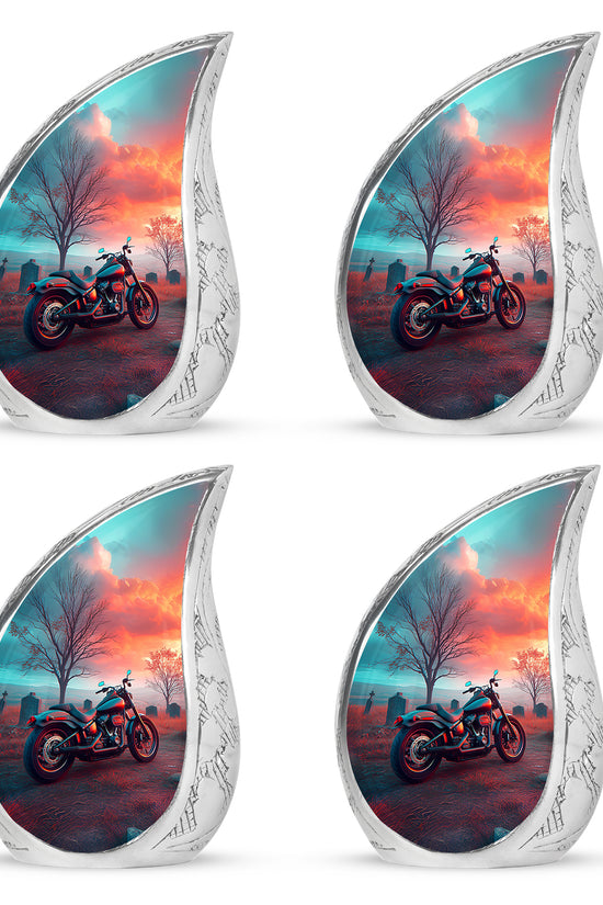 Sea Green Teal Bike Cremation Urn close-up of engraving and surface detail - flowing teardrop bike silhouette on curved aluminum - 10 inch aluminum urn for cremated remains