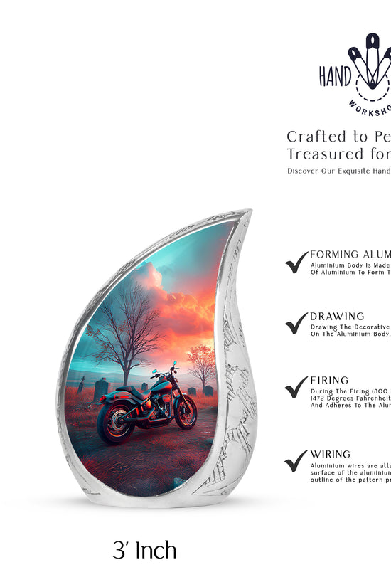 Aqua Teal Bike Cremation Urn angled view of lid and engraved motif - smooth teardrop contour featuring bike art - mini keepsake memorial for portion of cremation ashes