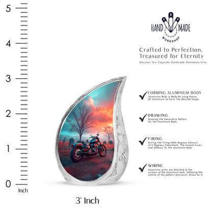 Aqua Teal Bike Cremation Urn angled view of lid and engraved motif - smooth teardrop contour featuring bike art - mini keepsake memorial for portion of cremation ashes