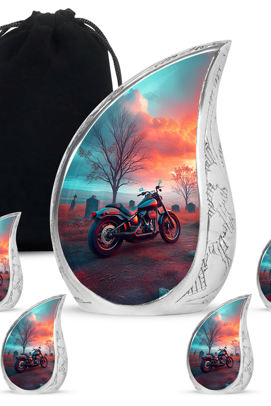 Aqua Teal Bike Cremation Urn side profile showing urn shape - smooth teardrop contour featuring bike art - memorial set with one large and four small urns