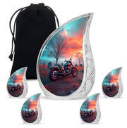 Aqua Teal Bike Cremation Urn side profile showing urn shape - smooth teardrop contour featuring bike art - memorial set with one large and four small urns