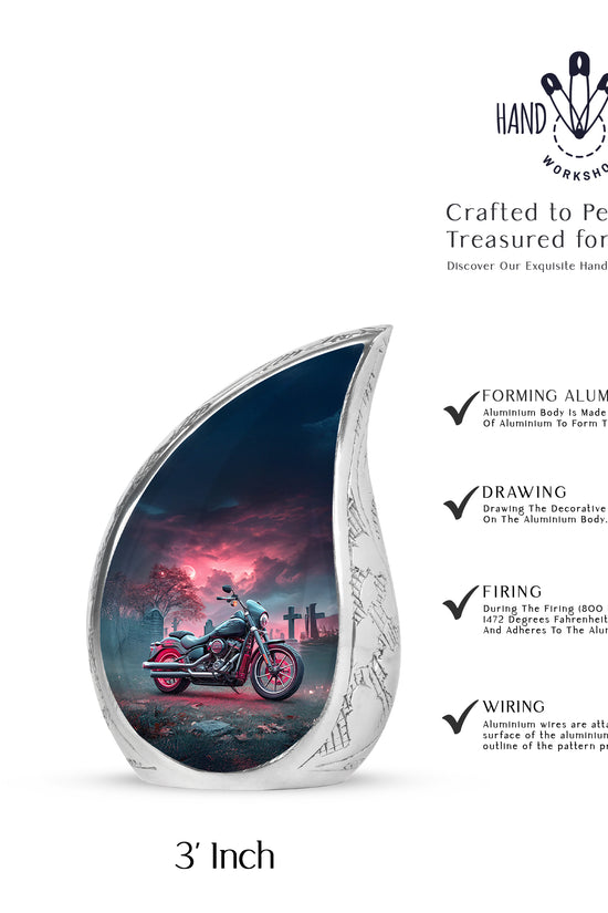 Royal Blue Bike Cremation Urn angled view of lid and engraved motif - smooth teardrop contour featuring bike art - mini keepsake memorial for portion of cremation ashes