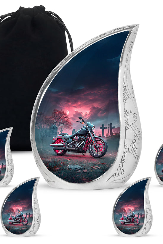 Bright Blue Bike Cremation Urn side profile showing urn shape - graceful tear-shaped urn with bike motif - memorial set with one large and four small urns