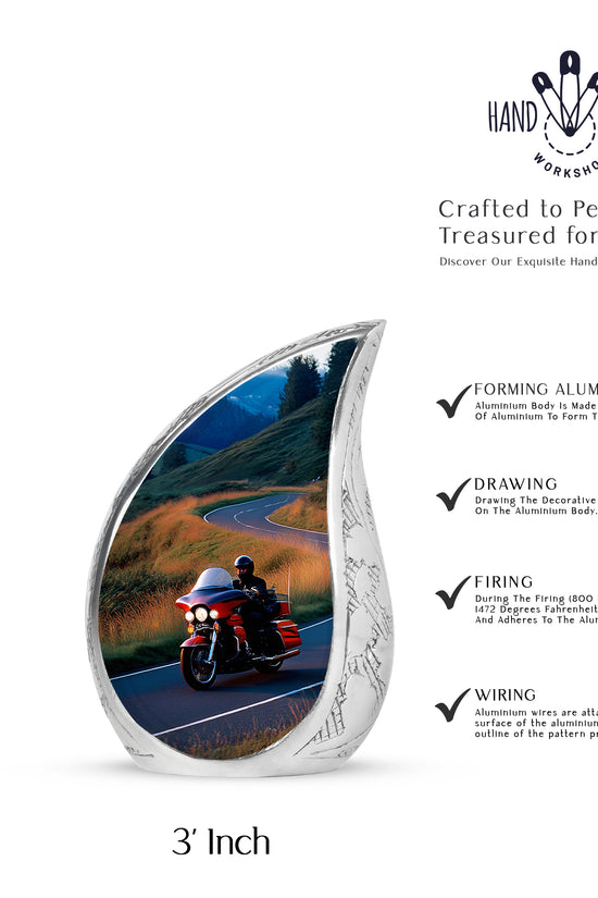 Slate Blue Bike Cremation Urn angled view of lid and engraved motif - rounded teardrop bike design with delicate detail - mini keepsake memorial for portion of cremation ashes