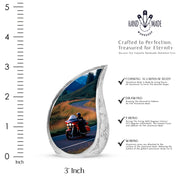 Slate Blue Bike Cremation Urn angled view of lid and engraved motif - rounded teardrop bike design with delicate detail - mini keepsake memorial for portion of cremation ashes