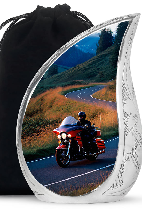 Calming Blue Bike Cremation Urn front view showing detailed design - graceful tear-shaped urn with bike motif - full-size 10 inch 200 cubic inch adult cremation urn