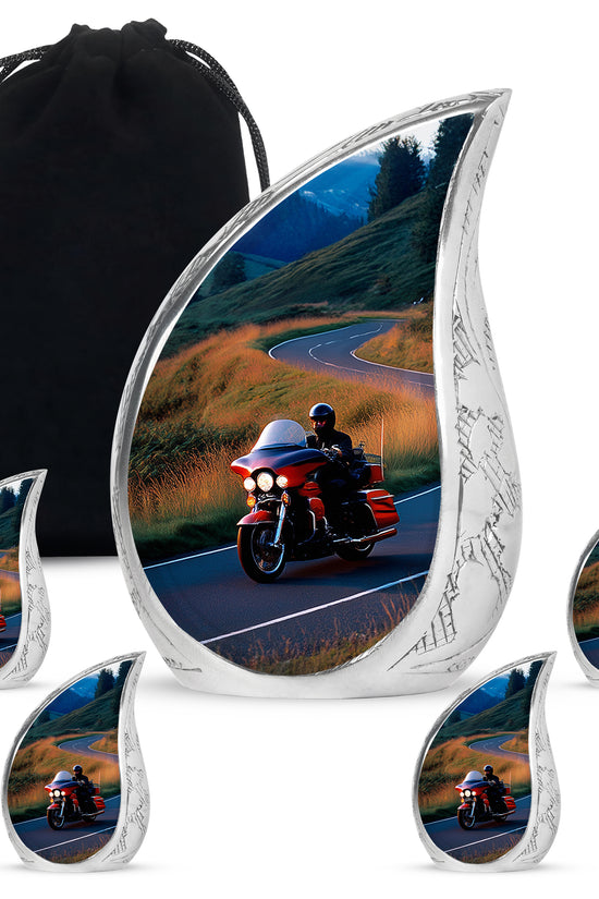 Cornflower Blue Bike Cremation Urn side profile showing urn shape - graceful tear-shaped urn with bike motif - memorial set with one large and four small urns