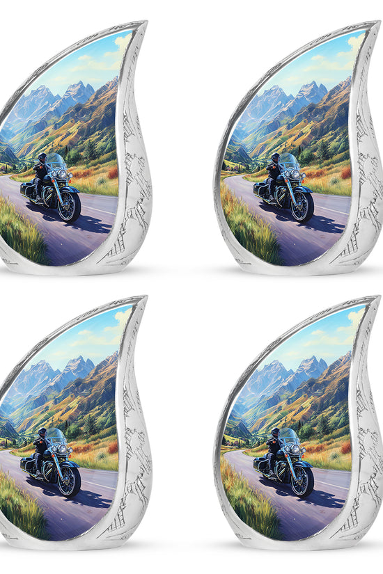 Misty Blue Bike Cremation Urn close-up of engraving and surface detail - flowing teardrop bike silhouette on curved aluminum - 10 inch aluminum urn for cremated remains