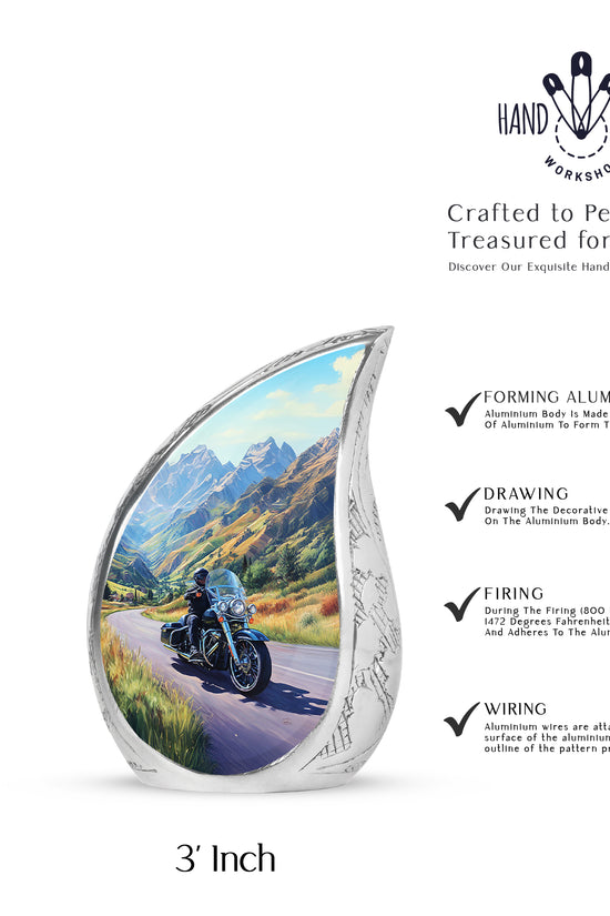 Azure Bike Cremation Urn angled view of lid and engraved motif - flowing teardrop bike silhouette on curved aluminum - mini keepsake memorial for portion of cremation ashes