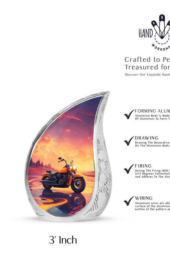 Peony Pink Bike Cremation Urn angled view of lid and engraved motif - flowing teardrop bike silhouette on curved aluminum - mini keepsake memorial for portion of cremation ashes