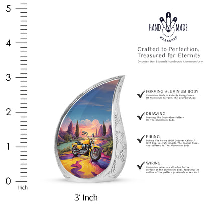 Vivid Blue Bike Cremation Urn angled view of lid and engraved motif - smooth teardrop contour featuring bike art - mini keepsake memorial for portion of cremation ashes