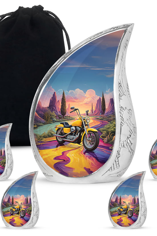 Celestial Blue Bike Cremation Urn side profile showing urn shape - flowing teardrop bike silhouette on curved aluminum - memorial set with one large and four small urns