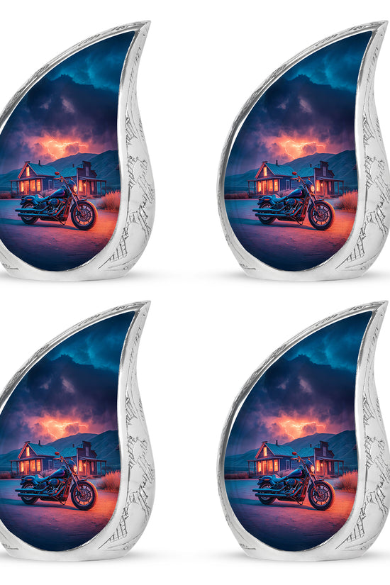 Dusty Blue Bike Cremation Urn close-up of engraving and surface detail - flowing teardrop bike silhouette on curved aluminum - 10 inch aluminum urn for cremated remains