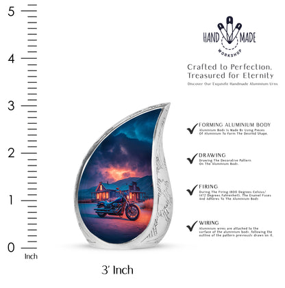 Cornflower Blue Bike Cremation Urn angled view of lid and engraved motif - smooth teardrop contour featuring bike art - mini keepsake memorial for portion of cremation ashes