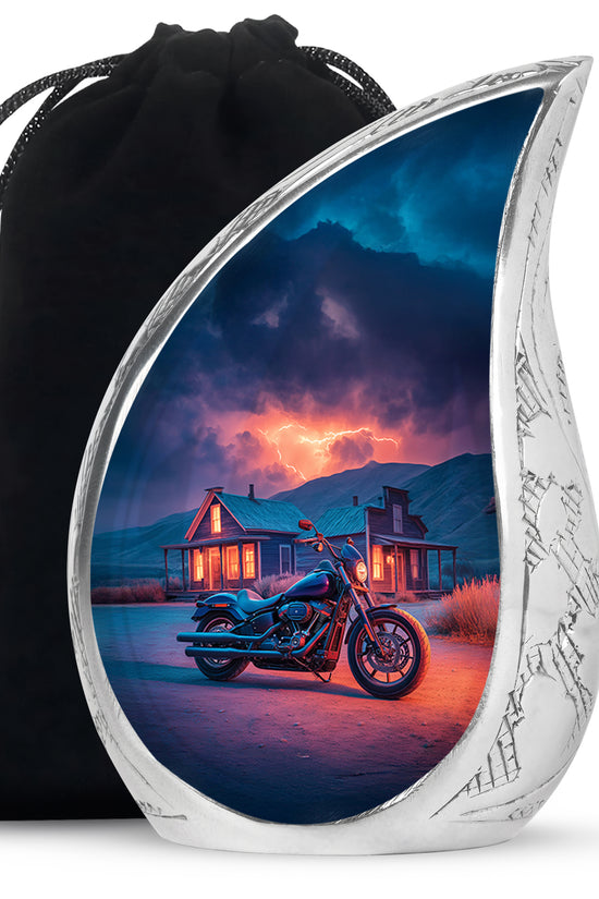 Twilight Blue Bike Cremation Urn front view showing detailed design - graceful tear-shaped urn with bike motif - full-size 10 inch 200 cubic inch adult cremation urn