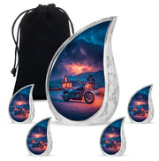 Icy Blue Bike Cremation Urn side profile showing urn shape - flowing teardrop bike silhouette on curved aluminum - memorial set with one large and four small urns