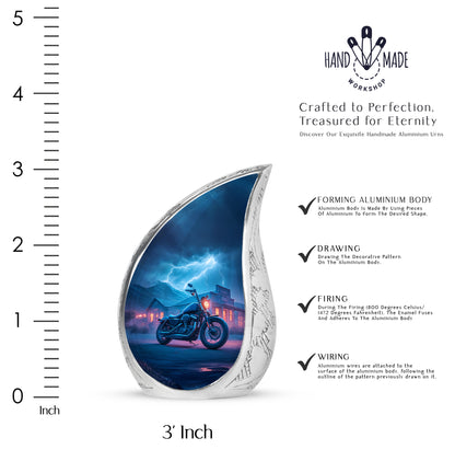 Calming Blue Bike Cremation Urn angled view of lid and engraved motif - graceful tear-shaped urn with bike motif - mini keepsake memorial for portion of cremation ashes