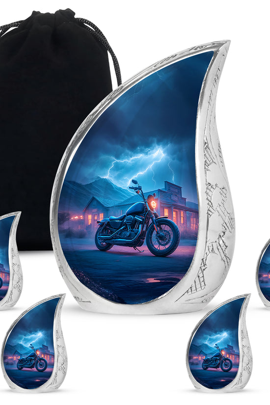 Slate Blue Bike Cremation Urn side profile showing urn shape - flowing teardrop bike silhouette on curved aluminum - memorial set with one large and four small urns