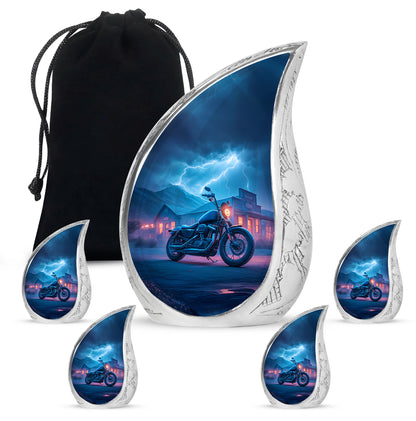 Slate Blue Bike Cremation Urn side profile showing urn shape - flowing teardrop bike silhouette on curved aluminum - memorial set with one large and four small urns