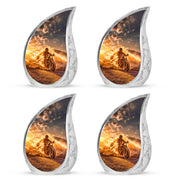 Harvest Gold Bike Cremation Urn close-up of engraving and surface detail - graceful tear-shaped urn with bike motif - 10 inch aluminum urn for cremated remains