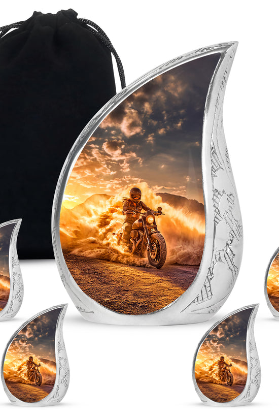 Matte Gold Bike Cremation Urn side profile showing urn shape - smooth teardrop contour featuring bike art - memorial set with one large and four small urns