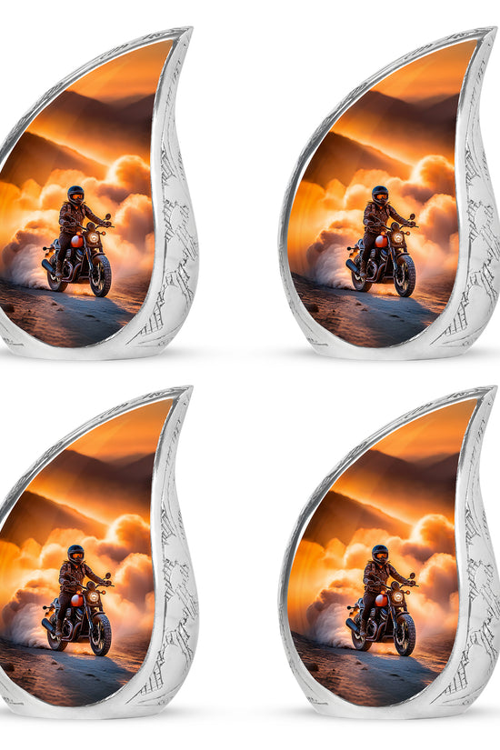 Warm Gold Bike Cremation Urn close-up of engraving and surface detail - smooth teardrop contour featuring bike art - 10 inch aluminum urn for cremated remains