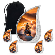 Burnished Gold Bike Cremation Urn side profile showing urn shape - smooth teardrop contour featuring bike art - memorial set with one large and four small urns