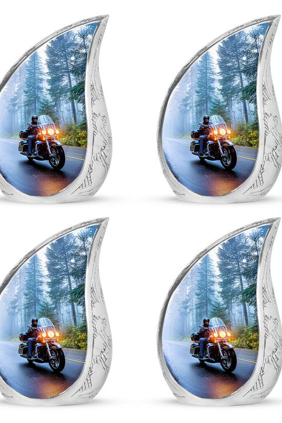 Soft Blue Bike Cremation Urn close-up of engraving and surface detail - smooth teardrop contour featuring bike art - 10 inch aluminum urn for cremated remains