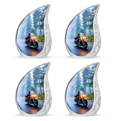 Soft Blue Bike Cremation Urn close-up of engraving and surface detail - smooth teardrop contour featuring bike art - 10 inch aluminum urn for cremated remains