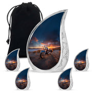 Charcoal Black Bike Cremation Urn side profile showing urn shape - smooth teardrop contour featuring bike art - memorial set with one large and four small urns