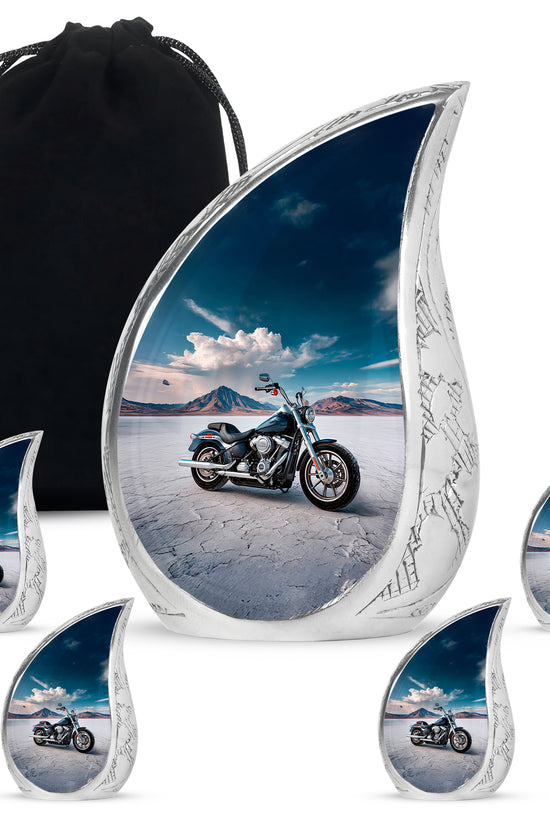Royal Blue Bike Cremation Urn side profile showing urn shape - smooth teardrop contour featuring bike art - memorial set with one large and four small urns