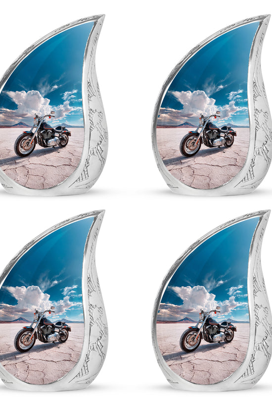 Slate Blue Bike Cremation Urn close-up of engraving and surface detail - flowing teardrop bike silhouette on curved aluminum - 10 inch aluminum urn for cremated remains