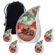 Mystic Teal Bike Cremation Urn side profile showing urn shape - graceful tear-shaped urn with bike motif - memorial set with one large and four small urns