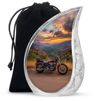 Navy Blue Bike Cremation Urn front view showing detailed design - flowing teardrop bike silhouette on curved aluminum - full-size 10 inch 200 cubic inch adult cremation urn