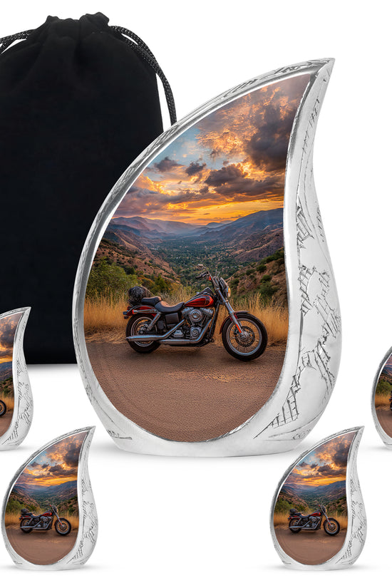 Cornflower Blue Bike Cremation Urn side profile showing urn shape - graceful tear-shaped urn with bike motif - memorial set with one large and four small urns