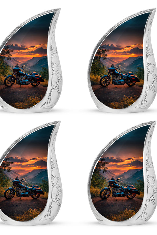 Misty Blue Bike Cremation Urn close-up of engraving and surface detail - flowing teardrop bike silhouette on curved aluminum - 10 inch aluminum urn for cremated remains