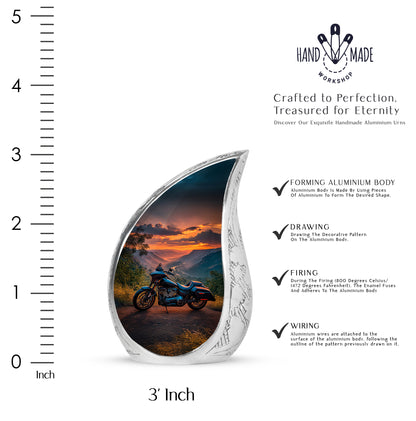 Slate Blue Bike Cremation Urn angled view of lid and engraved motif - flowing teardrop bike silhouette on curved aluminum - mini keepsake memorial for portion of cremation ashes