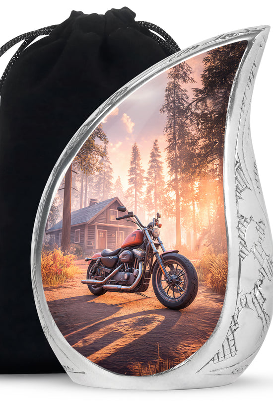 Ruby Red Bike Cremation Urn front view showing detailed design - graceful tear-shaped urn with bike motif - full-size 10 inch 200 cubic inch adult cremation urn