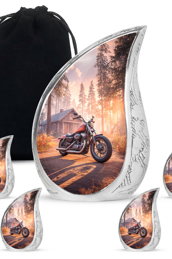 Wine Red Bike Cremation Urn side profile showing urn shape - rounded teardrop bike design with delicate detail - memorial set with one large and four small urns