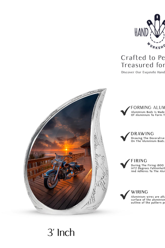 Dark Black Bike Cremation Urn angled view of lid and engraved motif - smooth teardrop contour featuring bike art - mini keepsake memorial for portion of cremation ashes