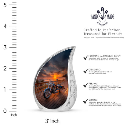 Dark Black Bike Cremation Urn angled view of lid and engraved motif - smooth teardrop contour featuring bike art - mini keepsake memorial for portion of cremation ashes
